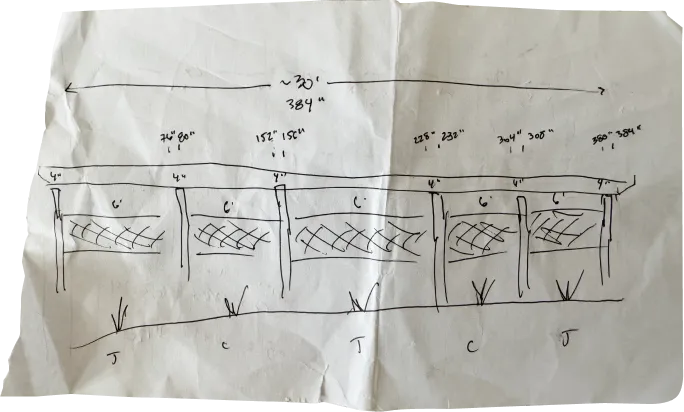 More refined fence design drawing showing hog wire panel sections and the decorative lattice-cap topper with diagonal crossbars
